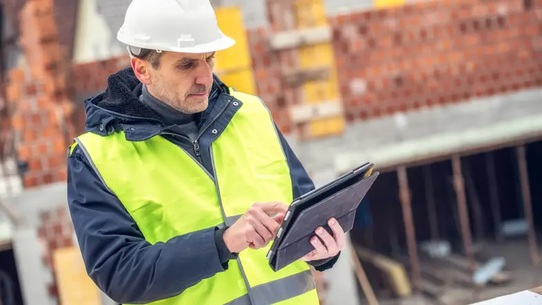 Engineer looking at tablet